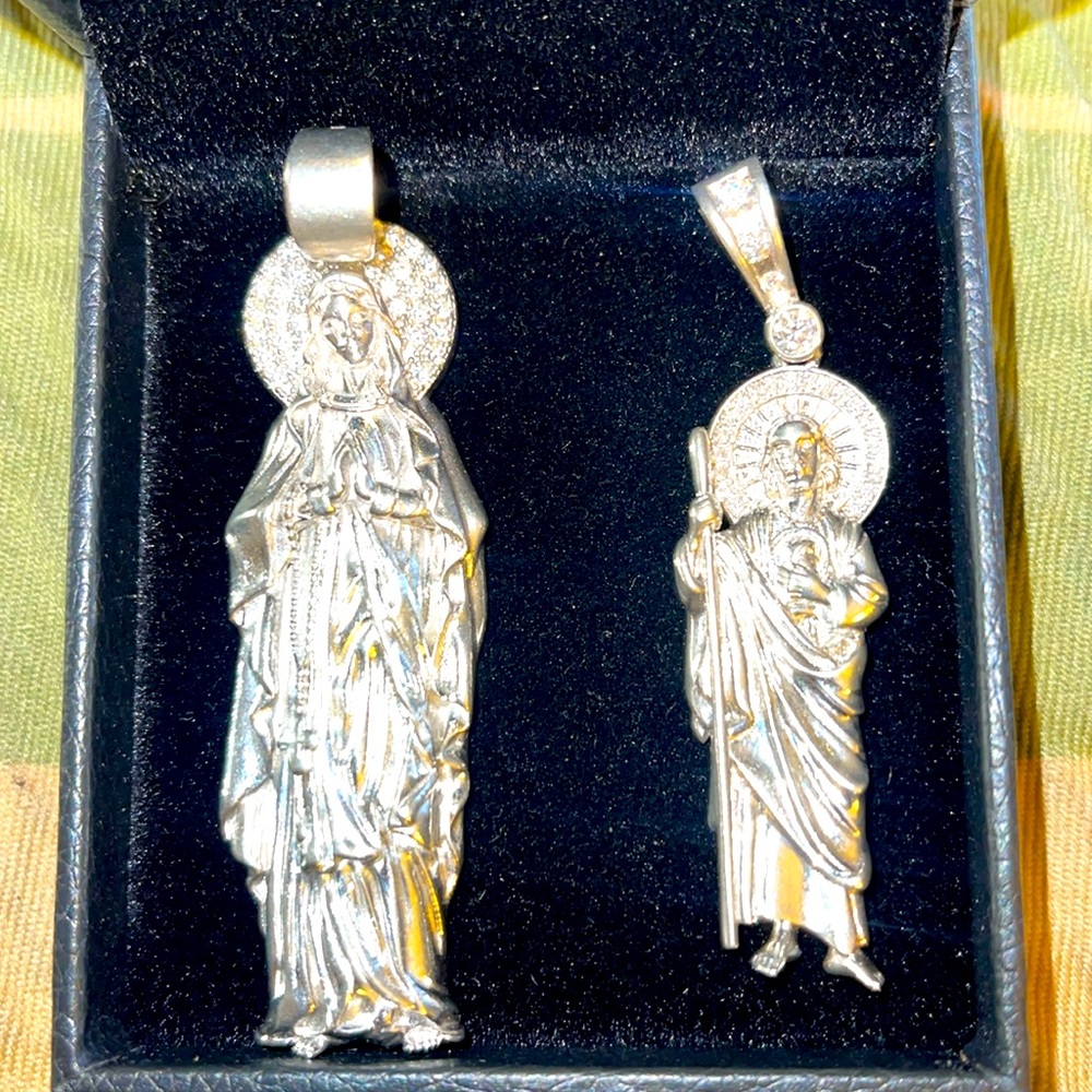 St Mary and Judas pendants.